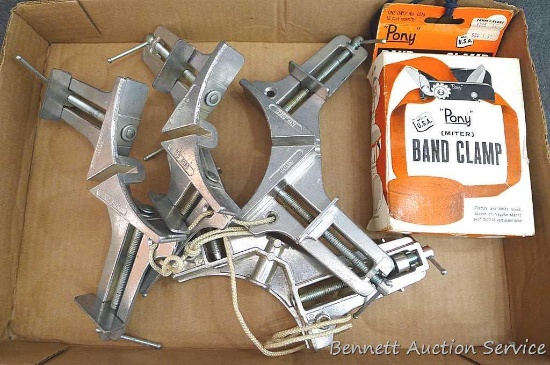 Pony brand miter band clamp and four Pony brand corner jig clamps. Clamps No. 9166, band Style 12.