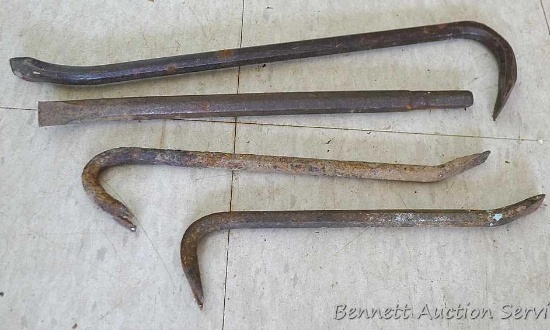 Three crowbars or prybars up to 18" an a scraper.