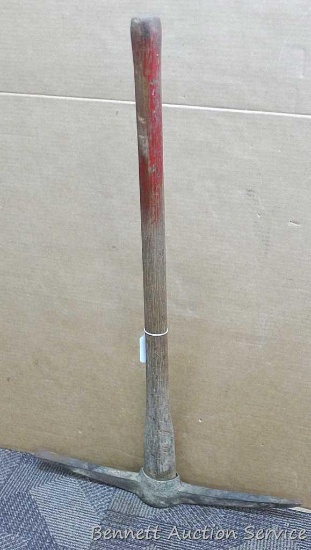 22" pick axe has a 3' handle. Handle should be tightened, head is marked.