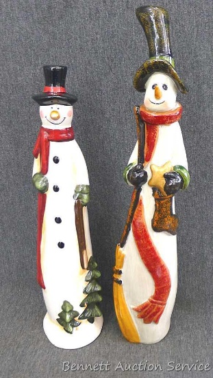 Two snowman figurines up to 16". A couple of small chips noted on smaller one, both in overall good