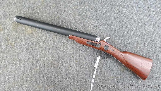 Double barrel shotgun cigarette lighter is 9-1/4" long. Sparks and lights but flame is weak. Buy