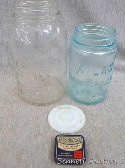 Blue Atlas jar, 1 qt Drey mason jar, white glass jar lid, and a vintage chocolate laxatives box.