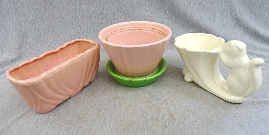 Vintage art pottery planters, one marked Shawnee USA534. Other pink one marked 113 USA. Pieces look