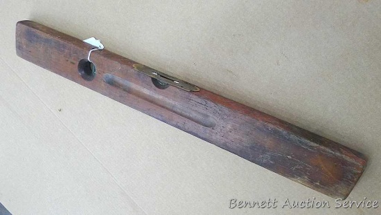 Vintage wooden Stanley level is 28" long. Vials are good.