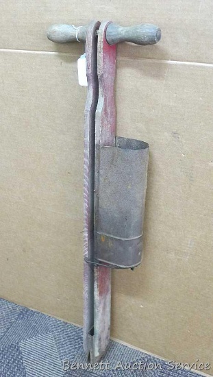 Old corn planter is 34" long with some original markings.
