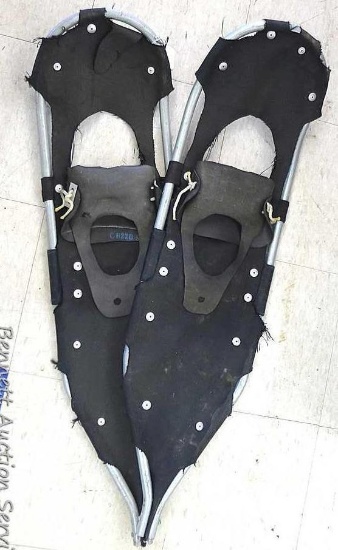 Aluminum framed snow shoes in fair condition. Snow shoes measure approx.. 38" x 10".