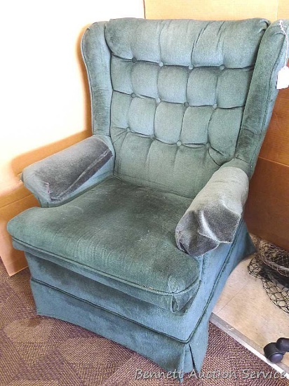 Very comfortable rocking and swivel arm chair. Chair measures approx.. 38" x 29" x 31" and looks to