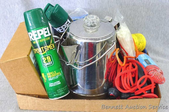 Assortment of camping supplies multitool, zip ties, insect repellent U-DIg-It fold up shovel,