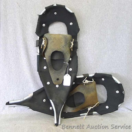 Pair of snow shoes with alluminum frame which measures approx.. 26" x 9".