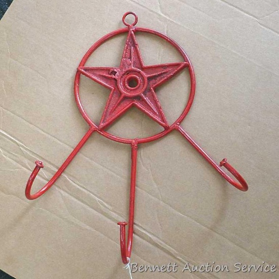 Very cool metal star themed coat hanger. Hanger measures approx.. 20" x 14".