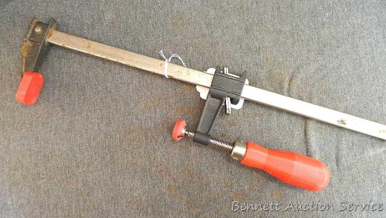 Nice extra long bar clamp. Great for clamping large projects. Clamp measures approx.. 40" x 4".