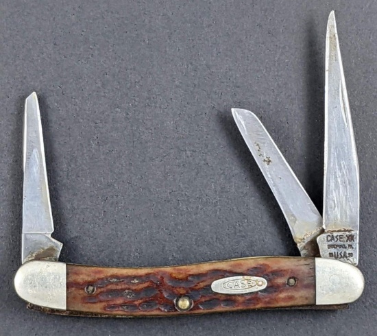 Case XX three blade pocket knife. Main blade is marked 'Case XX Bradford, PA, USA'; back of