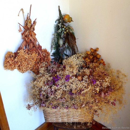 Beautiful dried flower arrangements. Largest measuring 39'' x 29'' wide, comes in a cute basket.