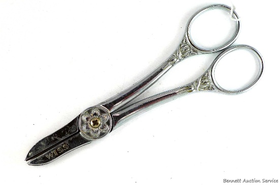 Antique Wiss flower shears measure 6-1/2" overall. Neat piece.