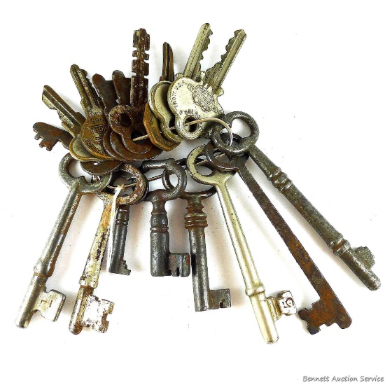 Ring of antique skeleton keys, longest is approx. 3-1/2".