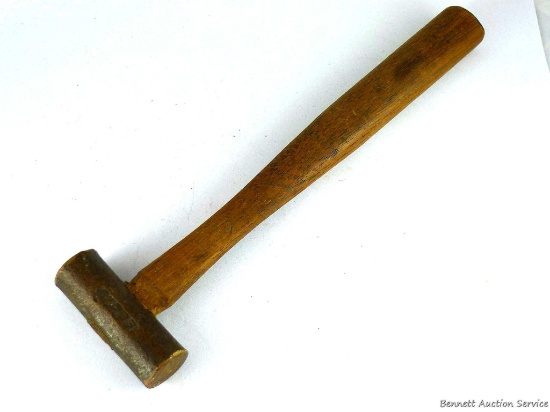 Cute little hammer with a brass head measures 7-3/4" overall. Brass head is nearly 3" wide.