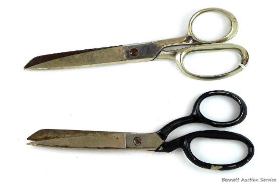Two sturdy pairs of scissors are each approx. 8" overall and both marked 'Italy'.