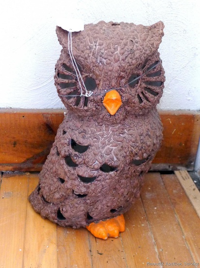 15'' tall decorative owl. Piece would look great decorating your garden.