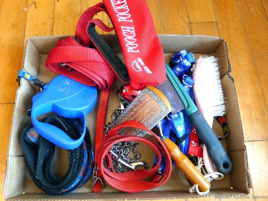A great pet care lot with leashes and brushes. Longer leash with zipper compartment measures 63''.
