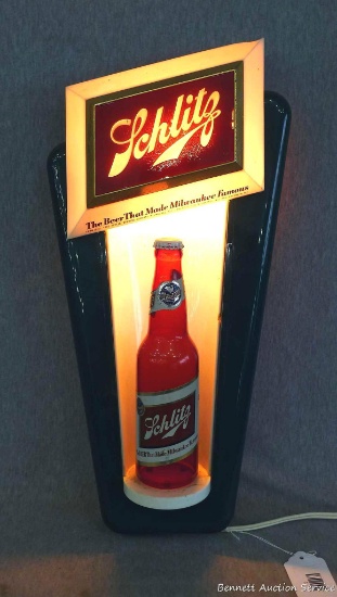 Schlitz light up, plastic beer sign. Sign is in good overall condition with some cracks on the back