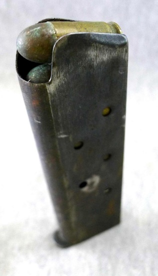 WWI 1911 magazine and cartridges. Magazine is marked colt 45 auto, FIVE rounds of .45ACP are head
