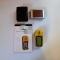 Garmin eTrex personal navigator with manual and Garmin Nuvi with case. eTrex powers up and the other