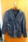 Men's leather jacket is size 24W and in good condition.
