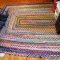 Very fun, brightly colored braided rug by NuLoom measures approx. 5' x 8'.