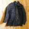 Heavy canvas men's winter coat with removable liner looks to be about a size medium. Sleeves are