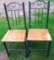 Two kitchen chairs in fair condition. Match lot 173.