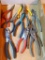 Assorted pliers and wire cutters.