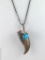 Bear claw and turquoise stone pendant on a 24