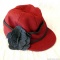 Women's Stormy Kromer cap; size 7/1/4. Burgundy with grey trim.