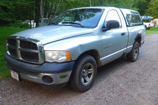 2003 Dodge Ram 1500 3.7 V6, 5 speed manual, 2 wheel drive pickup truck with topper.