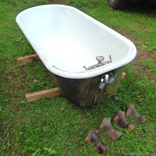 Antique clawfoot tub; measures 60" x 29" x 17-1/2" tall without legs, legs are 6-1/2" tall. Stamp on