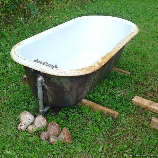 Antique Kohler clawfoot tub; measures 60" x 30" x 17-1/2" tall without legs, legs are 6-1/2" tall.