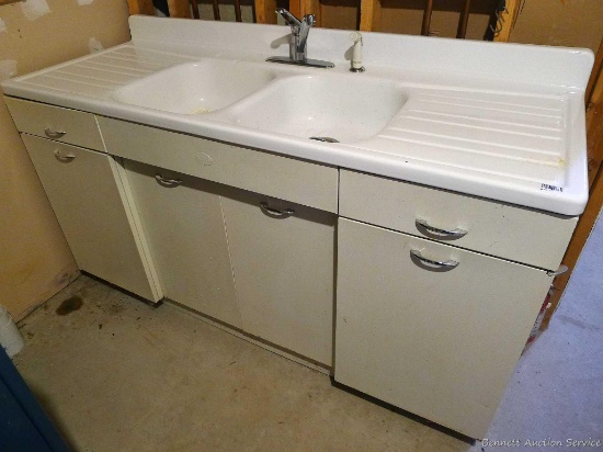 Vintage enamel double sink with wash board on either side and metal base; measures 66" x 25" x36"