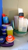 Very nice collection of Tupperware that includes large bowl, modular storage containers, a couple