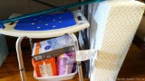 Shower chair, Conair heating pad, Unger grabber, foam wedge, Poise pads and underpads; foam wedge
