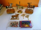 Carousel horses including 2 wind up music boxes, brass one with hooks and 2 other hooks and small