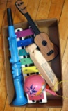 Children's musical instruments including Music World drum set with stool; Fisher Price music mat;