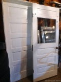 Two neat old doors are freshly painted. Unframed door measures 78