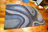 Area rug; measures 5' x 8'3