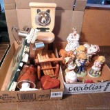 Home decorations including a neat dog marked H7328, coasters, wax warmer, trinket box, figurines,