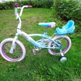 Huffy girls bike with training wheels is approx 24