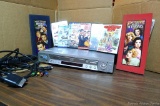 Sony DVD/CD player with DVDs including Grandma's Boy, Frankenstein, Baseketball, America's Wedding,