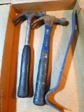 Sixteen oz. claw hammers and flat bar.