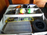 Tackle box filled with small stowaway boxes, lures, bobbers, fish line and more; box measures 13