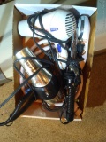 Hair dryers, curling iron and hand shower head.