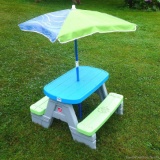 Adorable Step 2 children's picnic table with umbrella; table measures 29